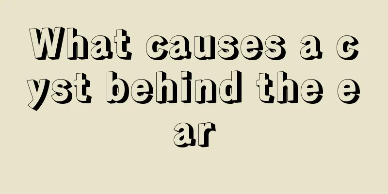 What causes a cyst behind the ear