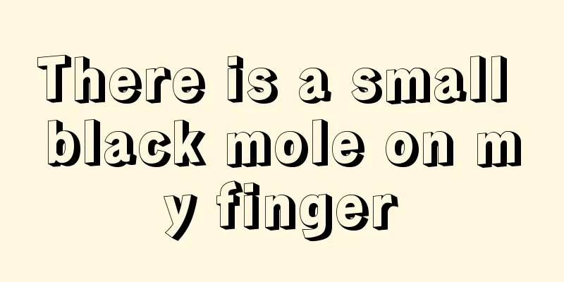 There is a small black mole on my finger