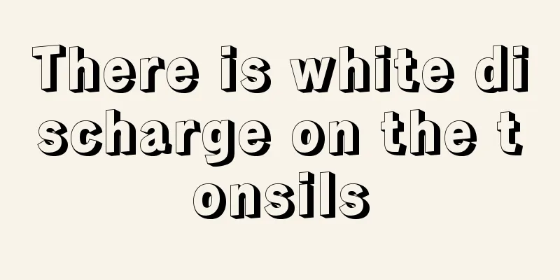 There is white discharge on the tonsils