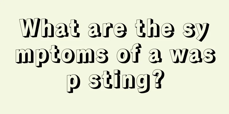 What are the symptoms of a wasp sting?