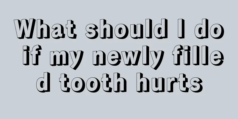 What should I do if my newly filled tooth hurts