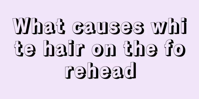 What causes white hair on the forehead