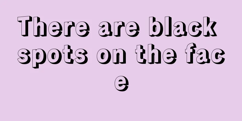 There are black spots on the face