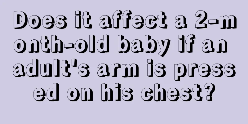 Does it affect a 2-month-old baby if an adult's arm is pressed on his chest?