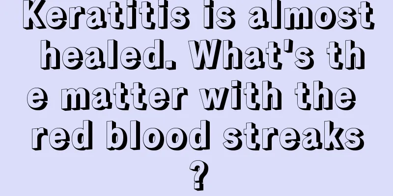 Keratitis is almost healed. What's the matter with the red blood streaks?