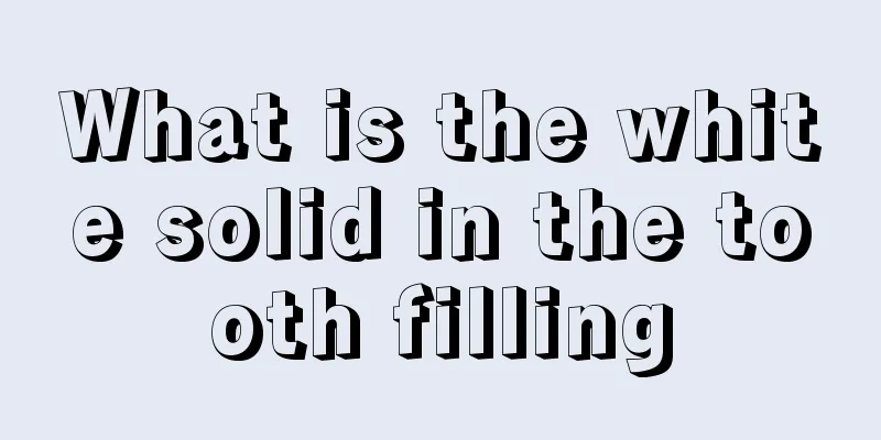 What is the white solid in the tooth filling