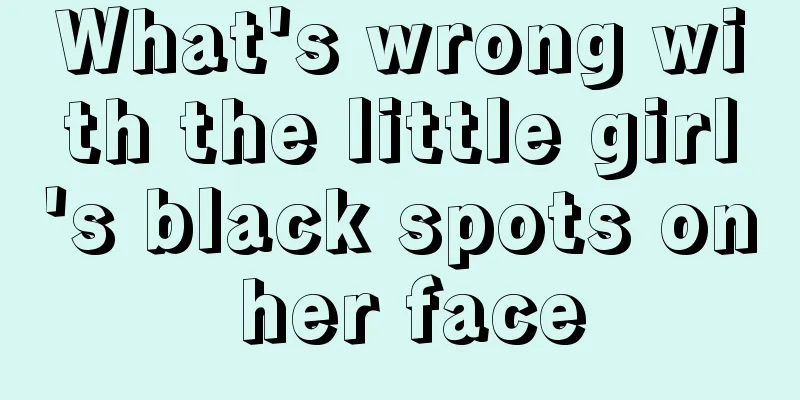 What's wrong with the little girl's black spots on her face