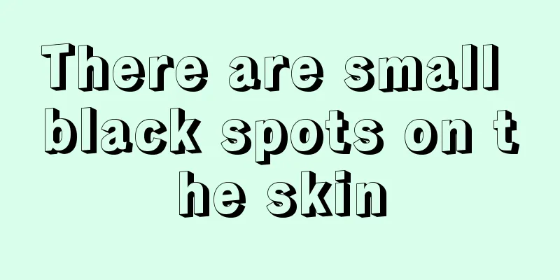 There are small black spots on the skin