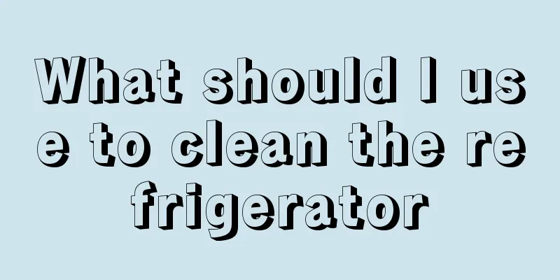 What should I use to clean the refrigerator