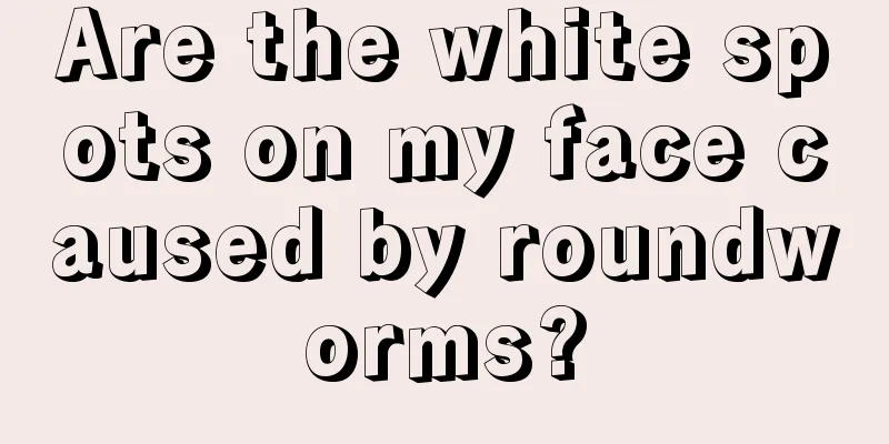 Are the white spots on my face caused by roundworms?