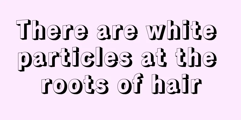 There are white particles at the roots of hair