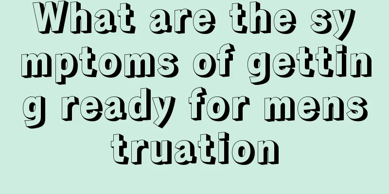 What are the symptoms of getting ready for menstruation