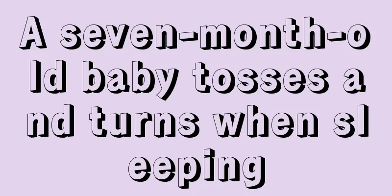 A seven-month-old baby tosses and turns when sleeping