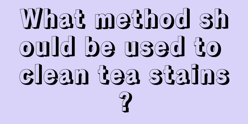 What method should be used to clean tea stains?
