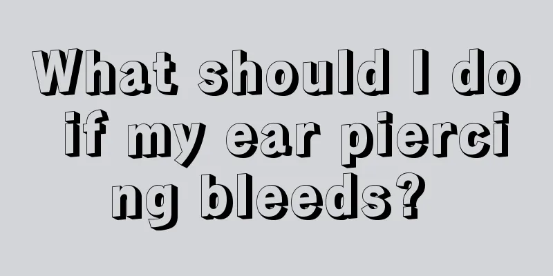 What should I do if my ear piercing bleeds? 