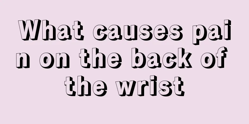 What causes pain on the back of the wrist