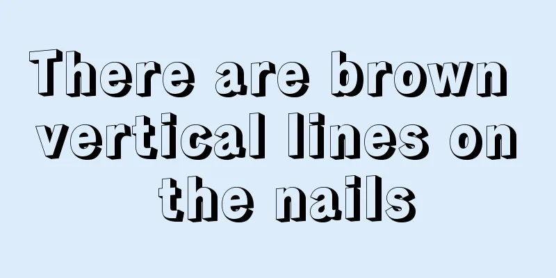 There are brown vertical lines on the nails