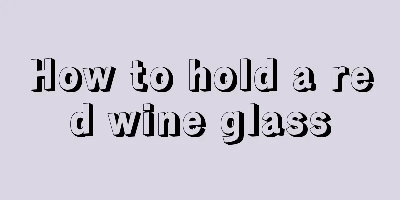 How to hold a red wine glass
