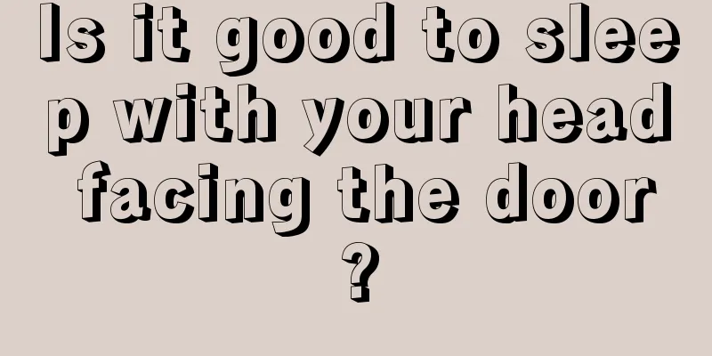 Is it good to sleep with your head facing the door?