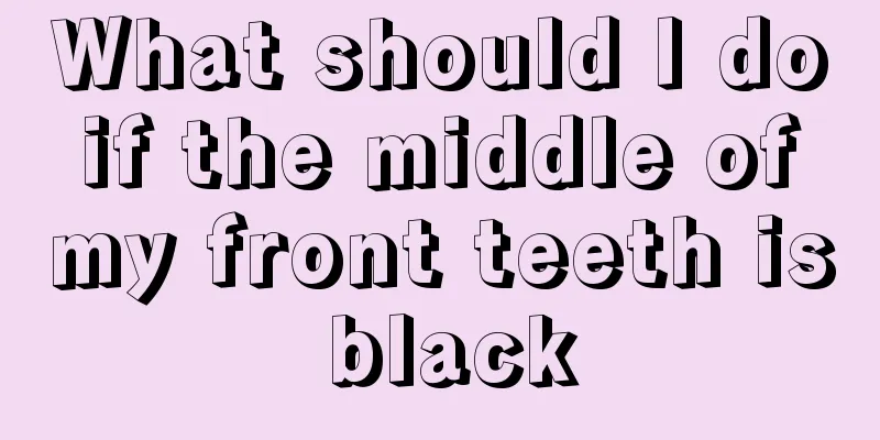 What should I do if the middle of my front teeth is black