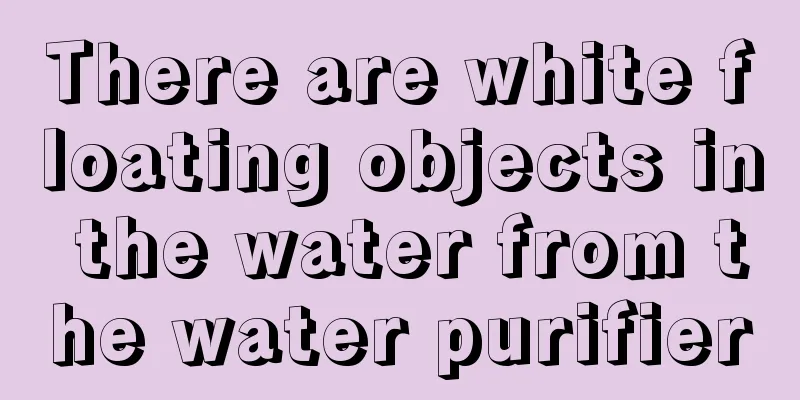 There are white floating objects in the water from the water purifier