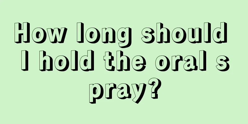 How long should I hold the oral spray?