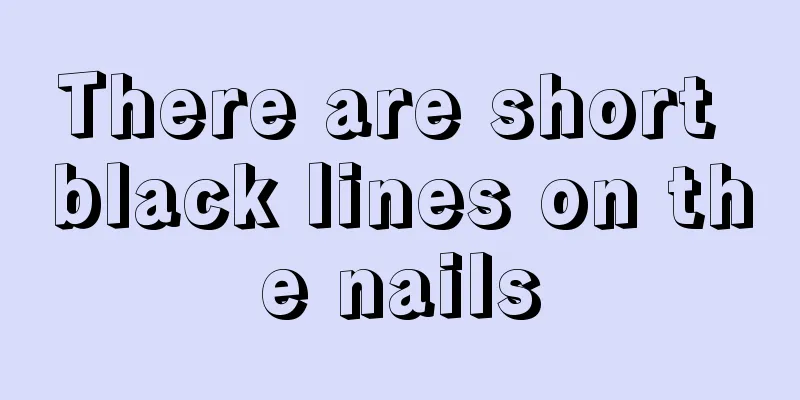 There are short black lines on the nails