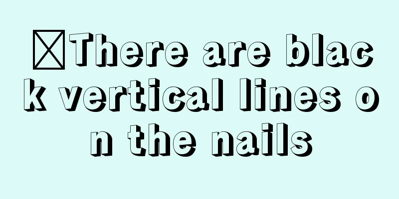 ​There are black vertical lines on the nails