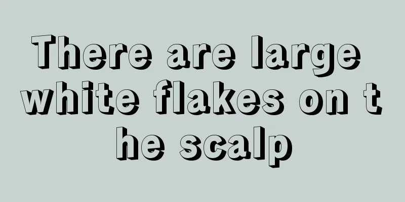 There are large white flakes on the scalp