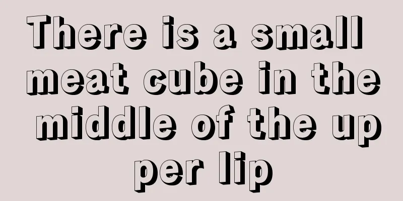 There is a small meat cube in the middle of the upper lip