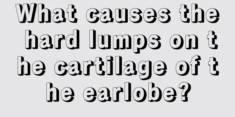 What causes the hard lumps on the cartilage of the earlobe?