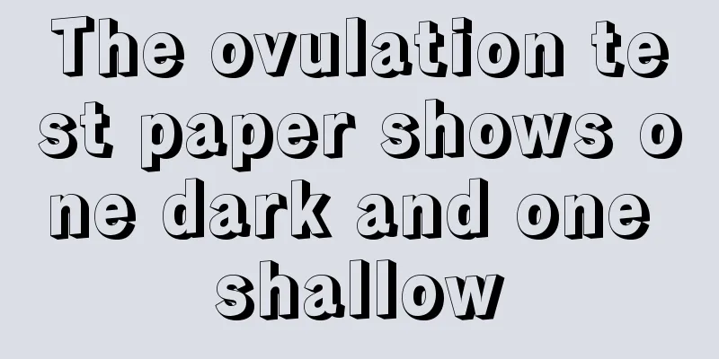 The ovulation test paper shows one dark and one shallow