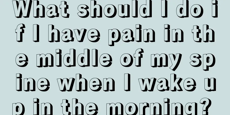 What should I do if I have pain in the middle of my spine when I wake up in the morning? 