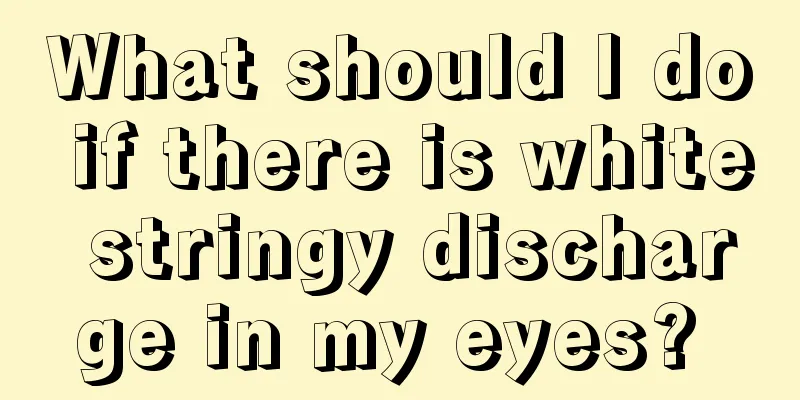 What should I do if there is white stringy discharge in my eyes? 