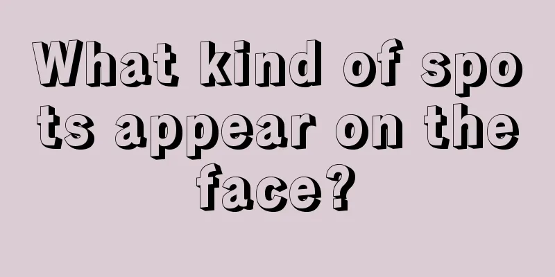 What kind of spots appear on the face? 