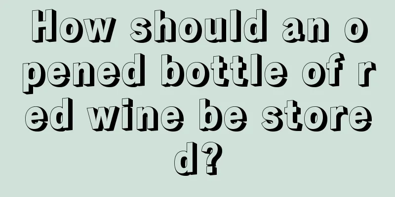 How should an opened bottle of red wine be stored?