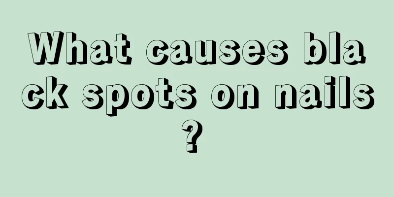 What causes black spots on nails? 