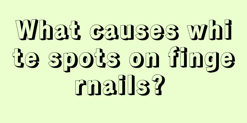 What causes white spots on fingernails? 
