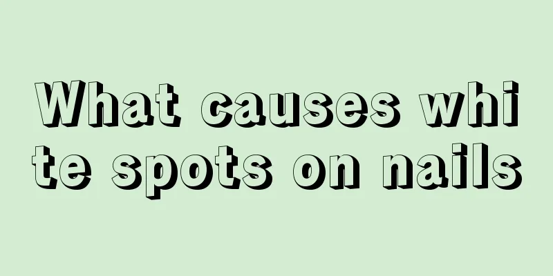 What causes white spots on nails