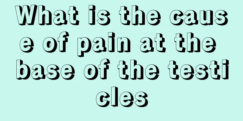 What is the cause of pain at the base of the testicles