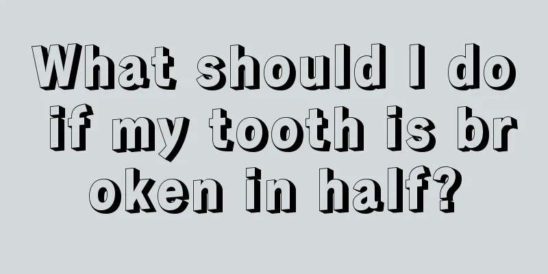 What should I do if my tooth is broken in half?