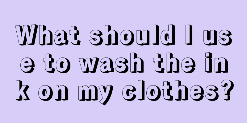What should I use to wash the ink on my clothes?