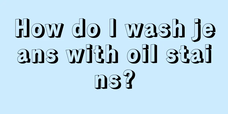 How do I wash jeans with oil stains?