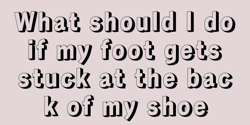 What should I do if my foot gets stuck at the back of my shoe