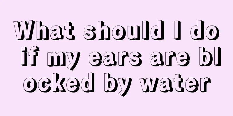 What should I do if my ears are blocked by water