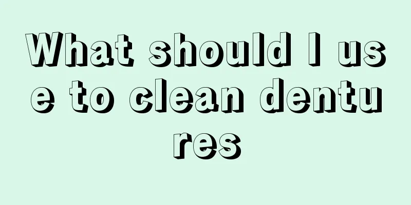 What should I use to clean dentures
