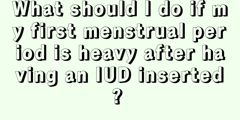 What should I do if my first menstrual period is heavy after having an IUD inserted? 
