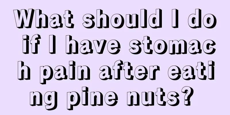 What should I do if I have stomach pain after eating pine nuts? 